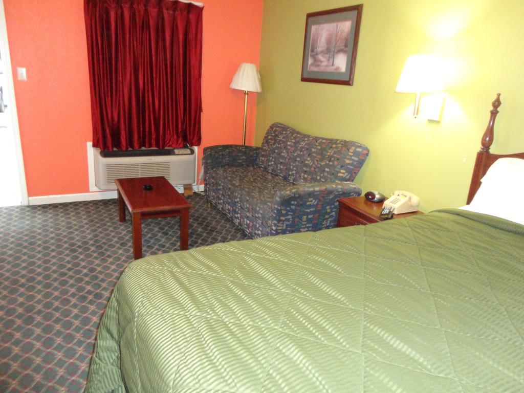 Royal Inn & Suites Туника Экстерьер фото
