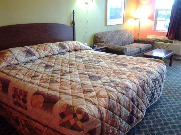 Royal Inn & Suites Туника Номер фото